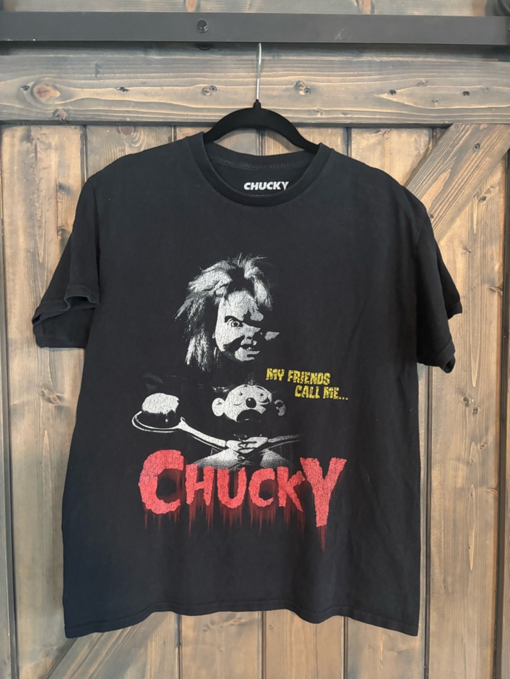 Hybrid & company Black “Chucky” Graphic Tee with Red Logo